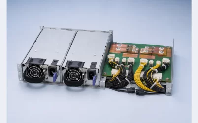 Complete 1+1 CRPS assembly with two power modules, distribution board, copper paths, and output harnesses